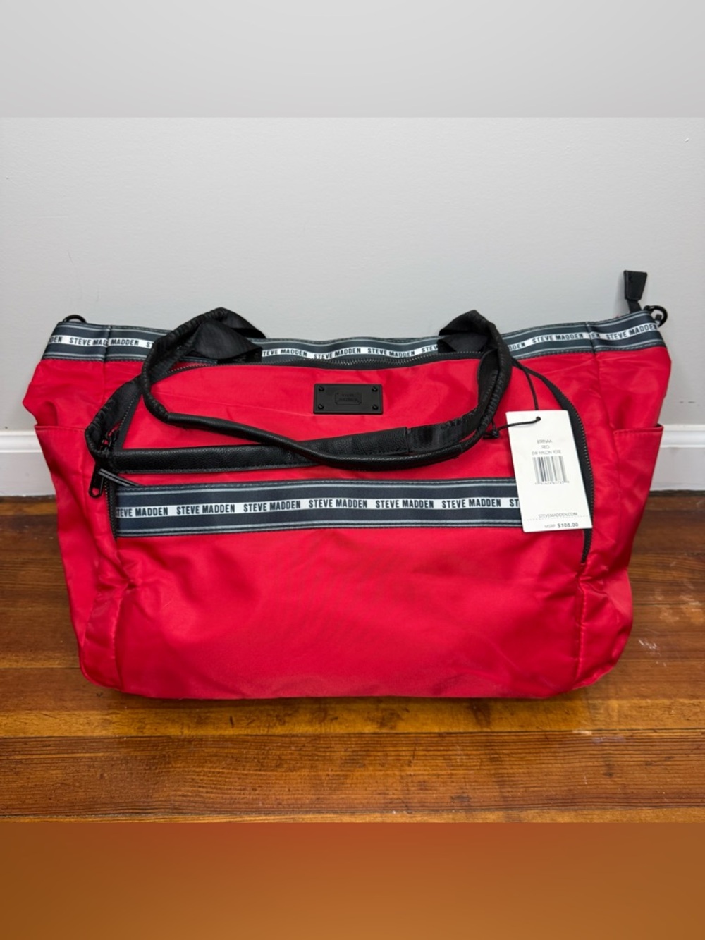 Steve Madden Red Handbag with Black Logo Plate